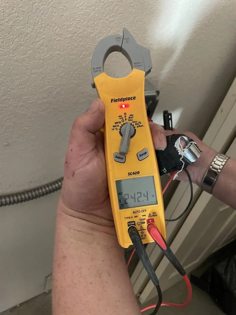 Voltage testing with clamp meter during Electrical Installation Services in Tamaqua